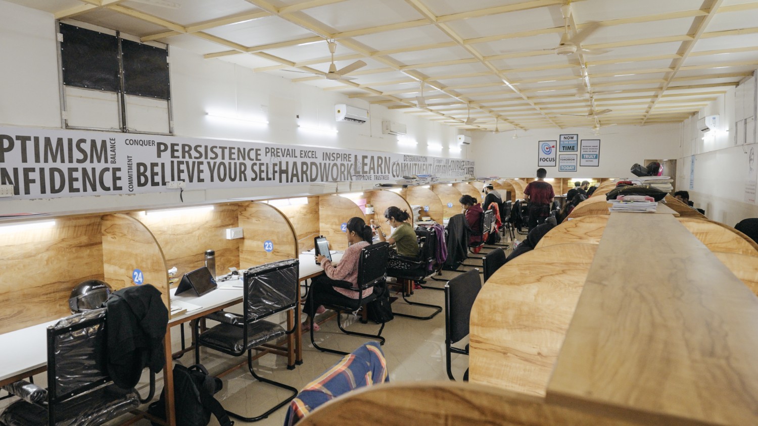 Students studying in individual cubicles at Cherian Ashram Academic Residence